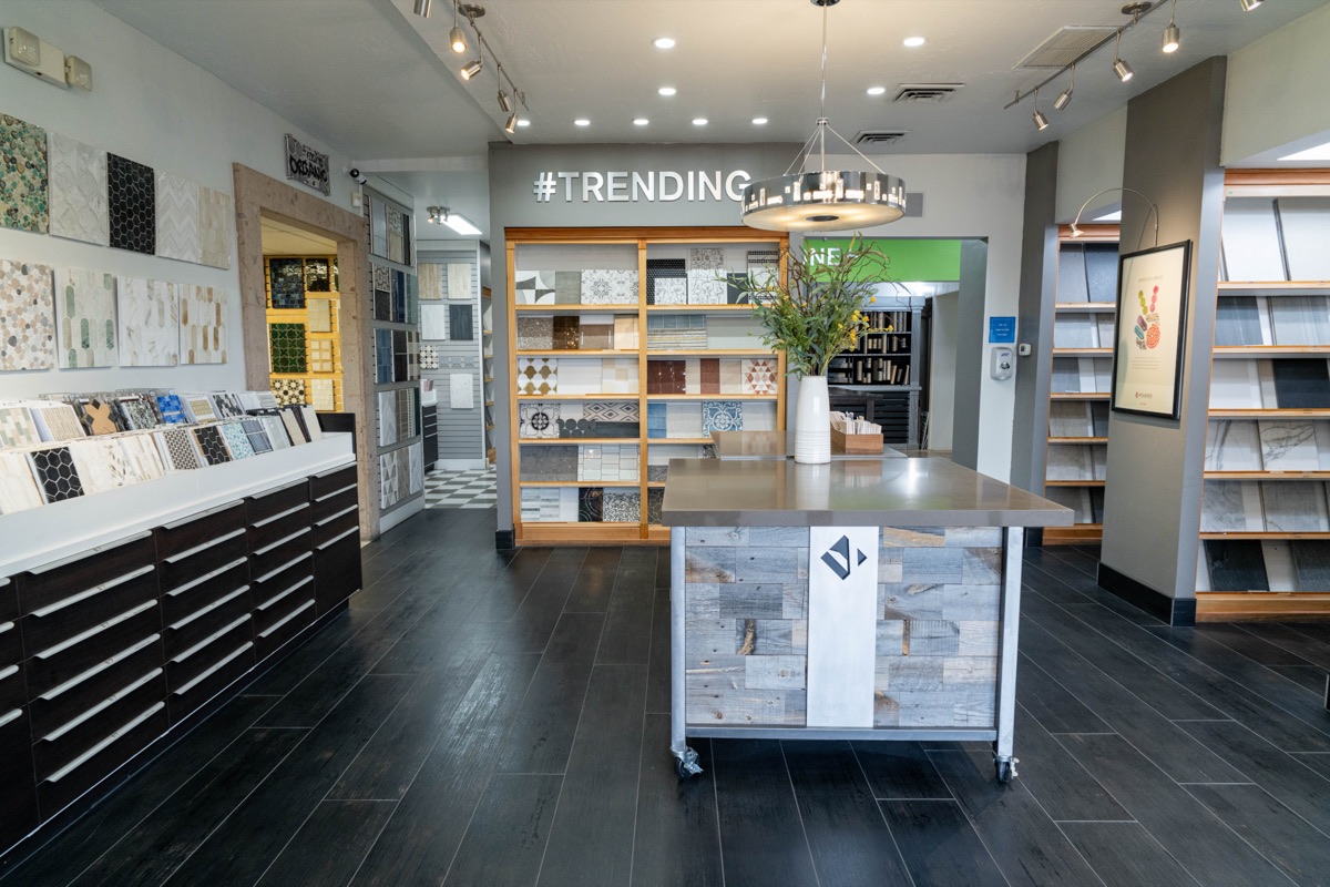 Inviting interior view of the Villagio showroom, tile and stone displays arranged for browsing